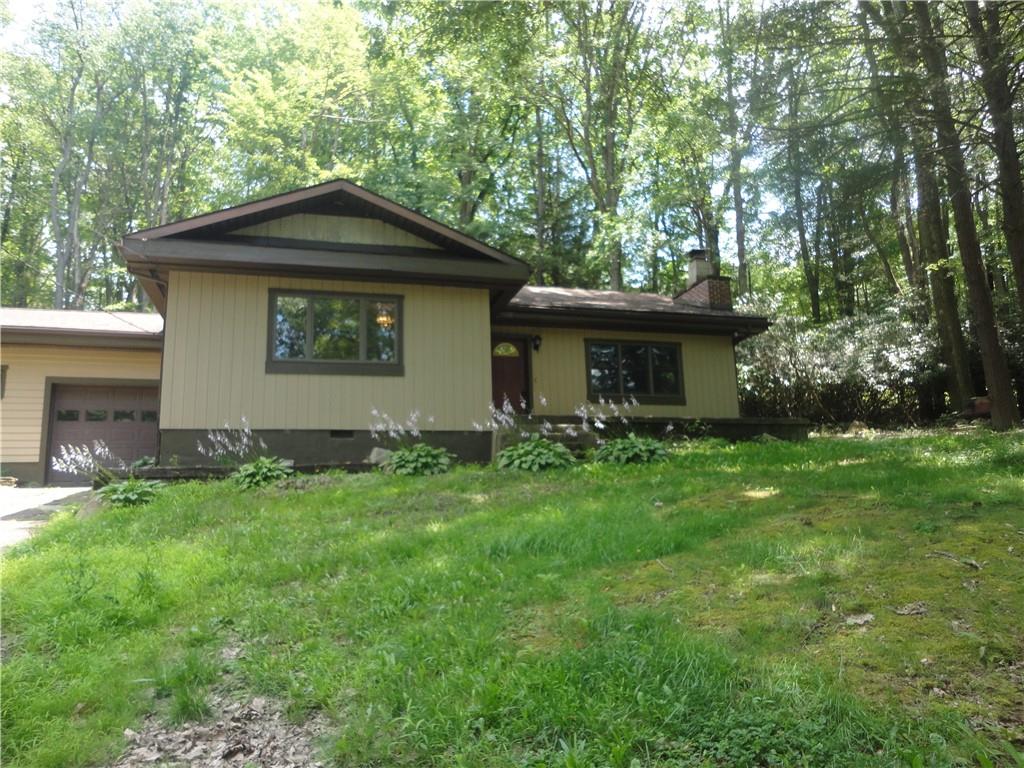 3202 Listonburg Road Confluence, PA 15424 - Photo 23 of 26 a front view of a house with garden