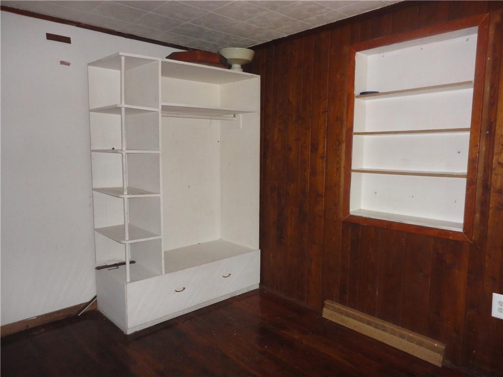 3202 Listonburg Road Confluence, PA 15424 - Photo 8 of 26 a view of an empty room with wooden floor and a window