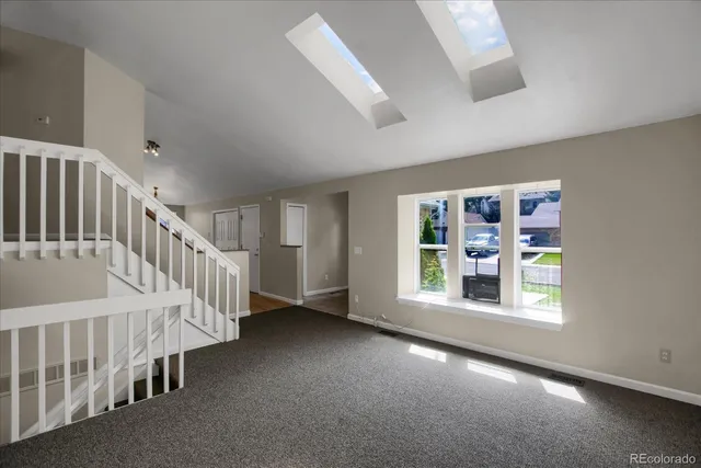 an empty room with windows