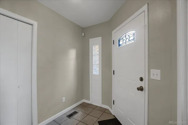 a view of a hallway with staircase