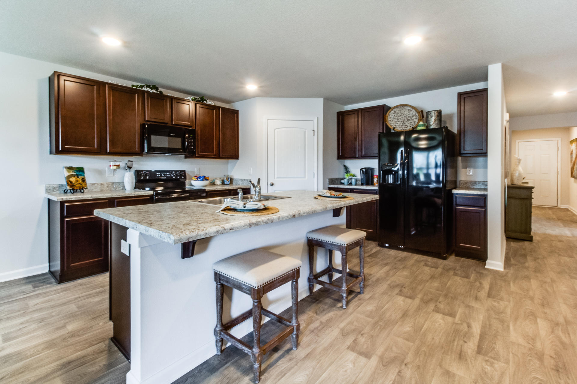 965 Indian Woman Road Santa Rosa Beach, FL 32459 - Photo 13 of 25 a kitchen with a sink cabinets and stainless steel appliances