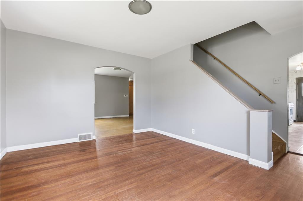 64 Harmon Creek Road Burgettstown, PA 15021 - Photo 7 of 29 a view of an empty room with wooden floor