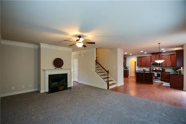 a view of a livingroom with furniture and a fireplace