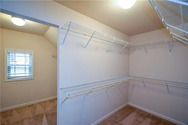 a view of a room with racks on the wall