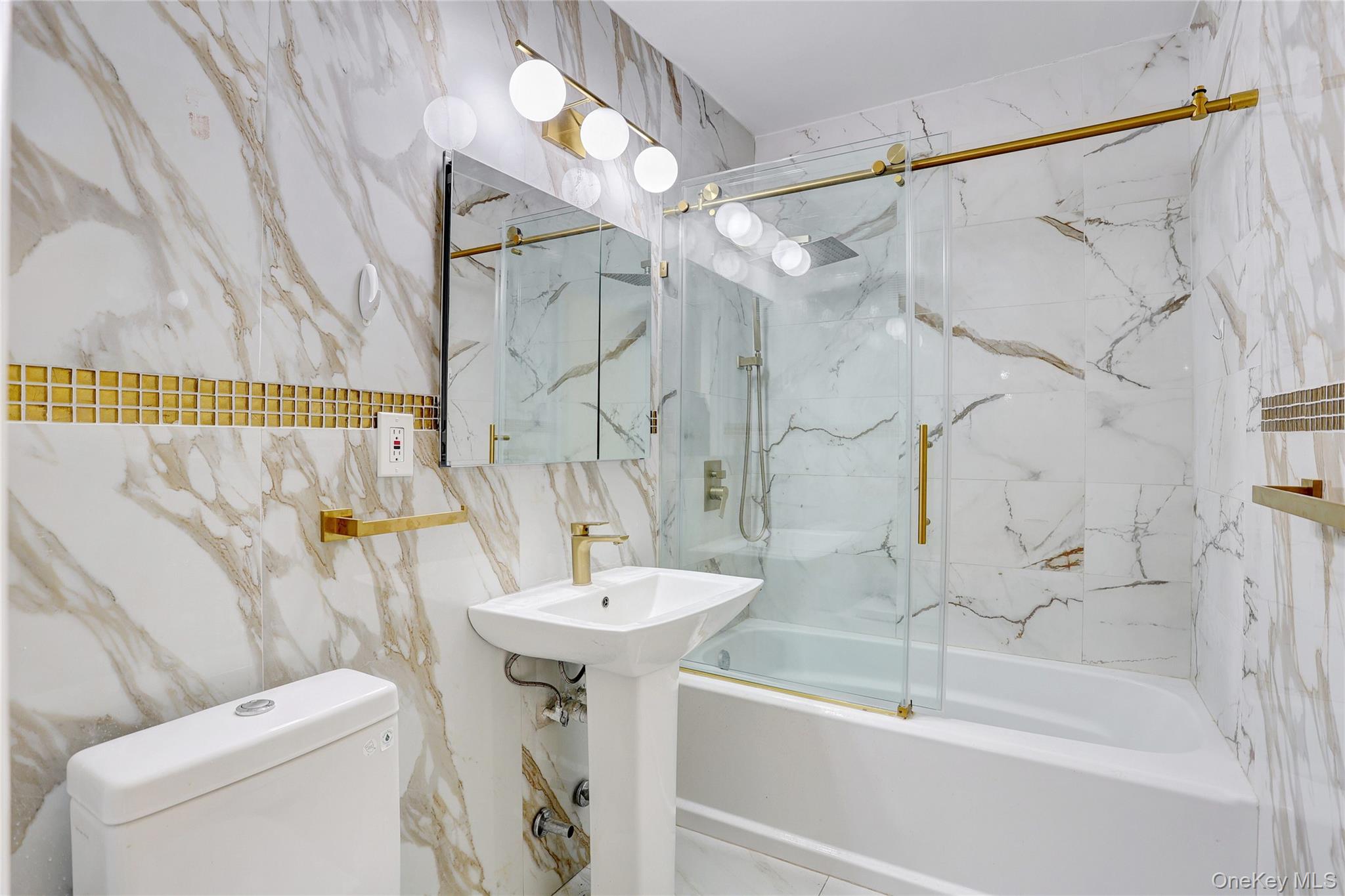 5 Secora Road, Unit F7 Spring Valley, NY 10977 - Photo 11 of 21 a bathroom with a sink toilet and shower