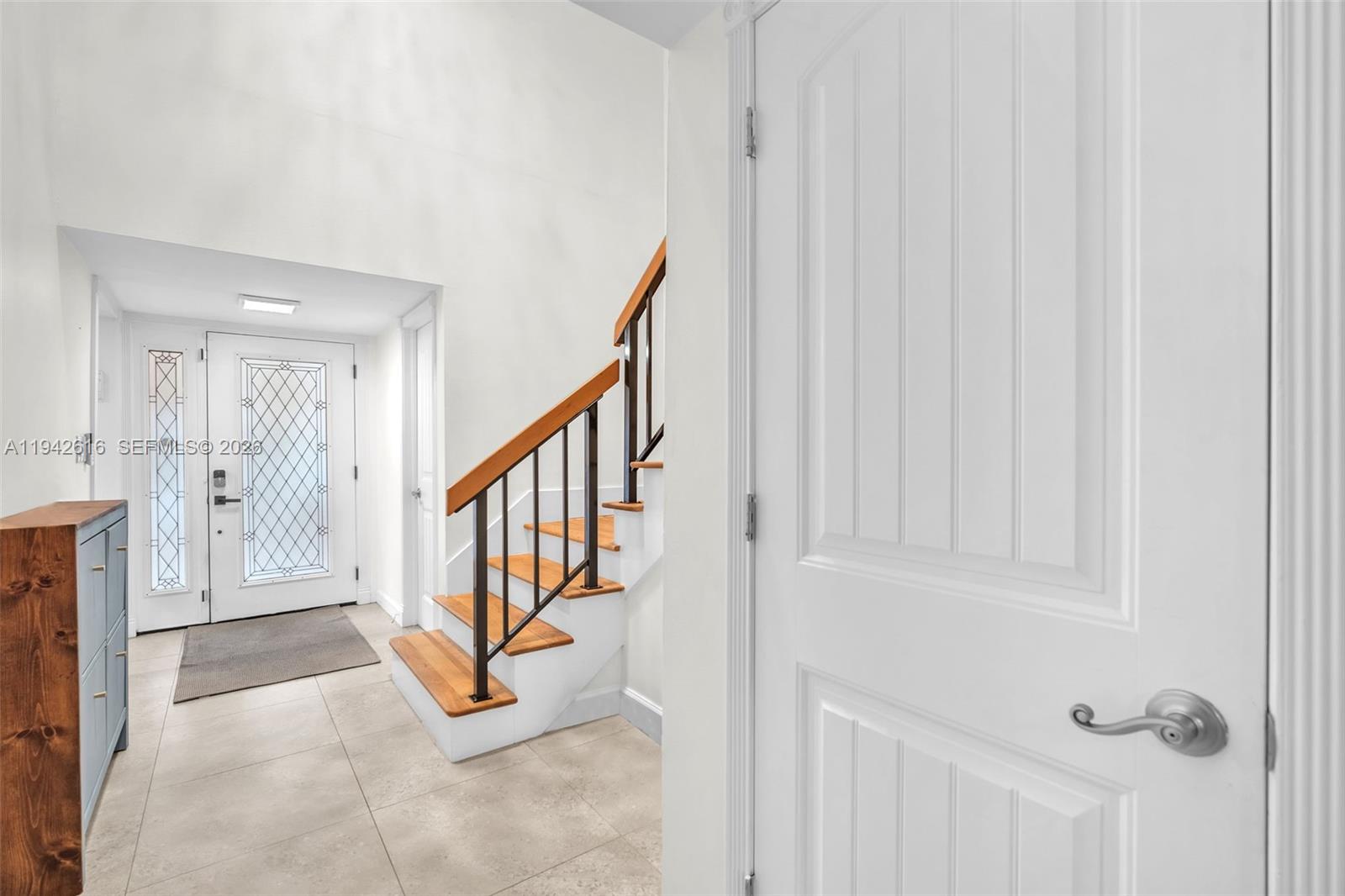 107 Heatherbrook Way, Unit 145 Hollywood, FL 33021 - Photo 11 of 57 a view of an entryway with wooden floor