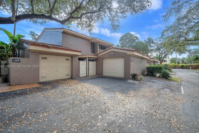 a house with trees in front of it