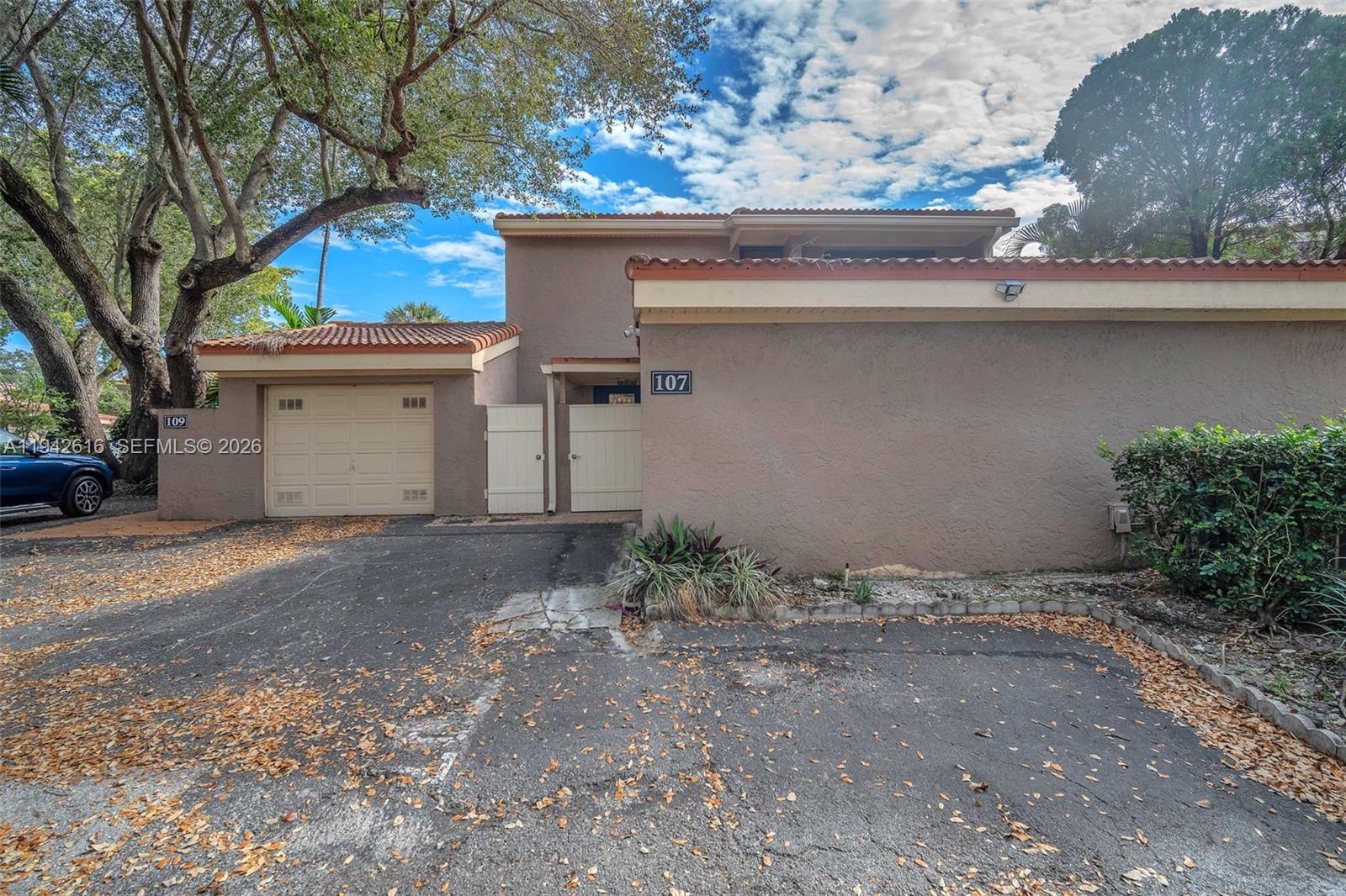 107 Heatherbrook Way, Unit 145 Hollywood, FL 33021 - Photo 46 of 57 a house view with a outdoor space
