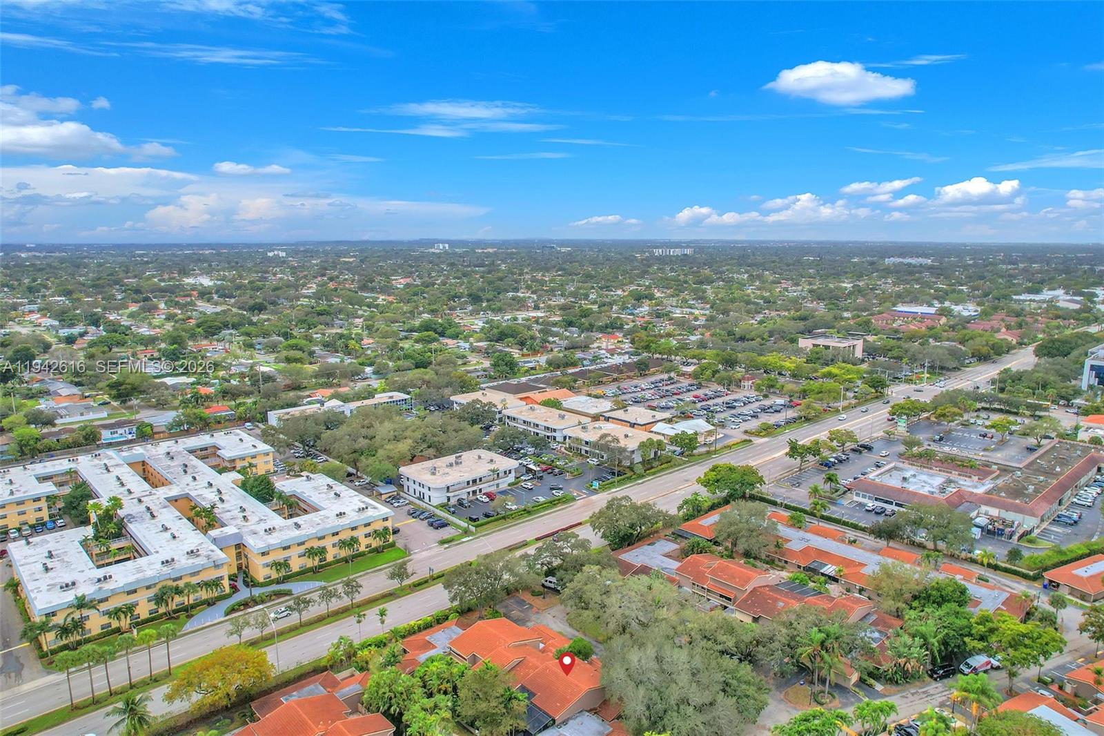 107 Heatherbrook Way, Unit 145 Hollywood, FL 33021 - Photo 49 of 57 an aerial view of residential building with outdoor space and trees