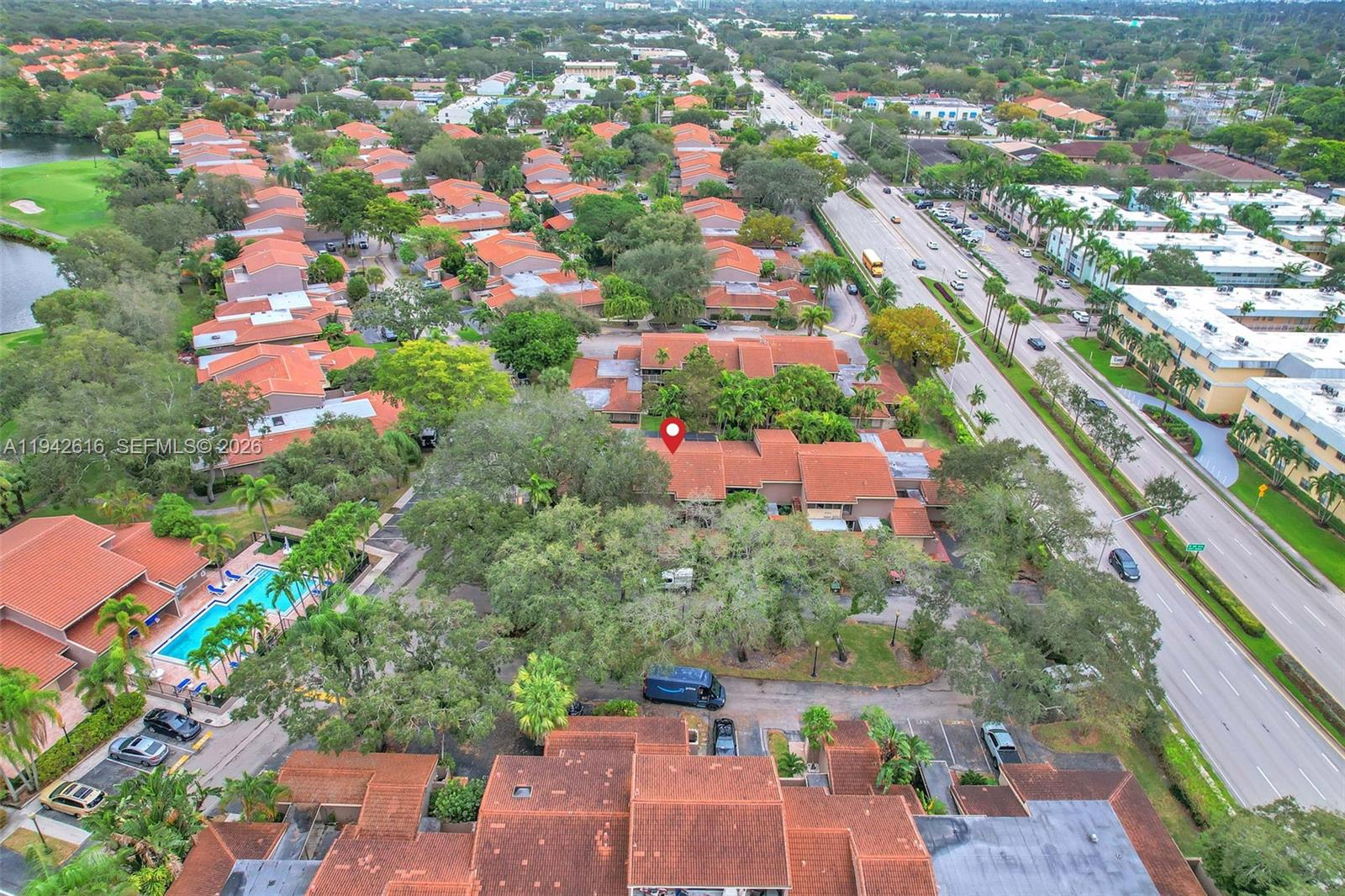 107 Heatherbrook Way, Unit 145 Hollywood, FL 33021 - Photo 53 of 57 an aerial view of a city with lots of residential buildings