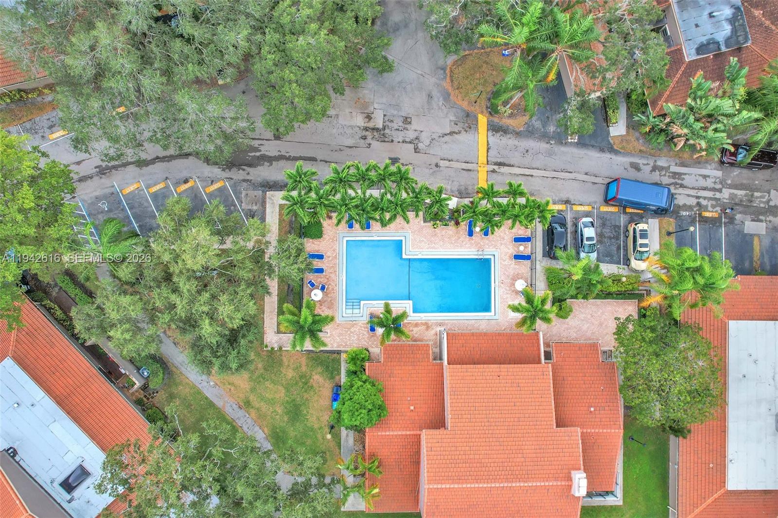 107 Heatherbrook Way, Unit 145 Hollywood, FL 33021 - Photo 54 of 57 an aerial view of a house with a yard basket ball court and outdoor seating