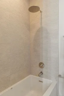 a bathroom with a tub