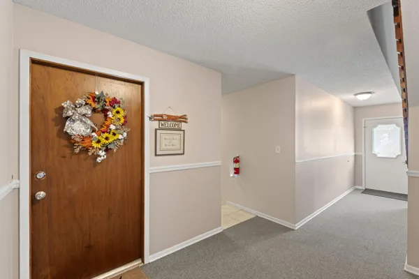 a view of elevator with wooden floor