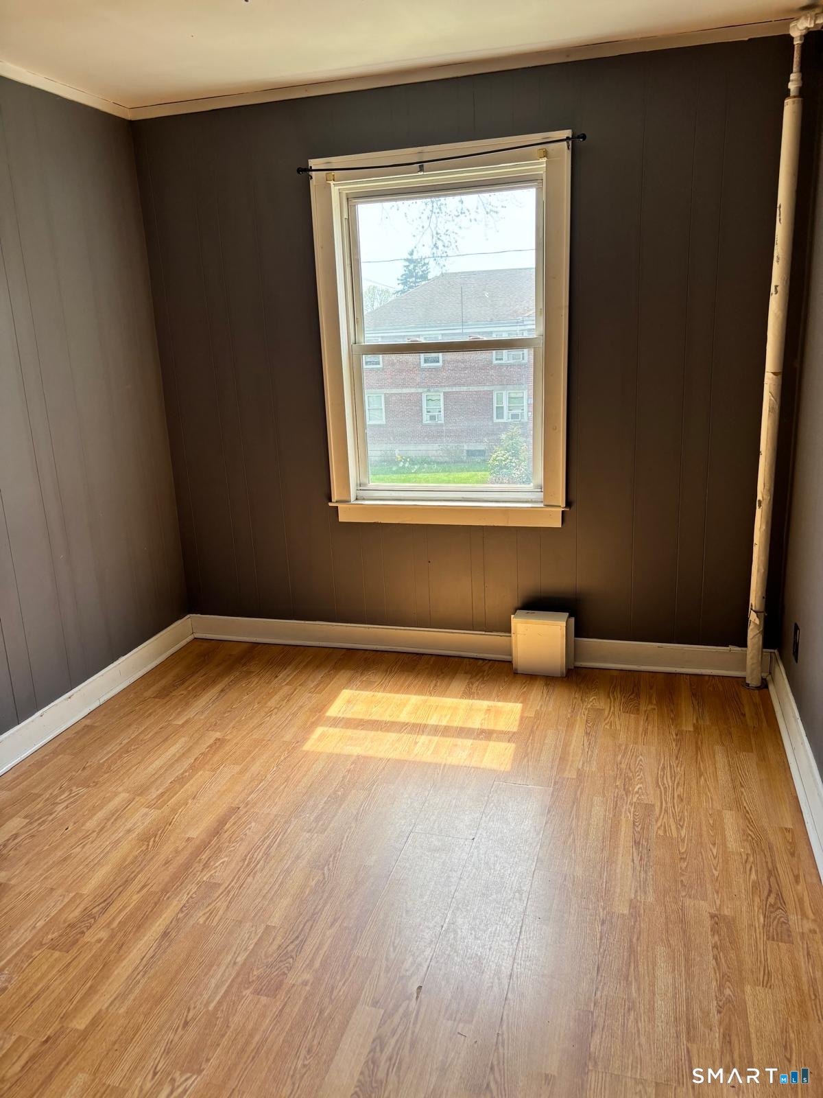 744 Canaan Road, Unit 23 Bridgeport, CT 06610 - Photo 2 of 12 an empty room with a window