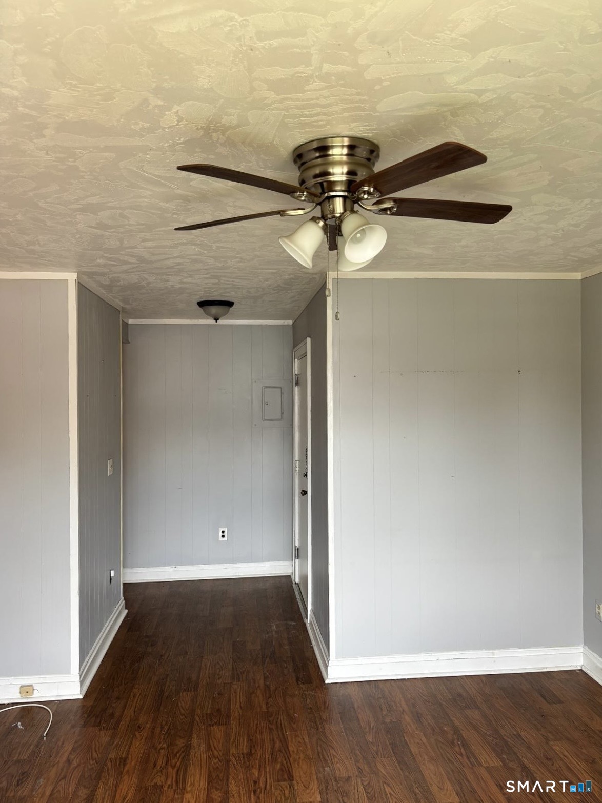 744 Canaan Road, Unit 23 Bridgeport, CT 06610 - Photo 3 of 12 a view of room with wooden floor