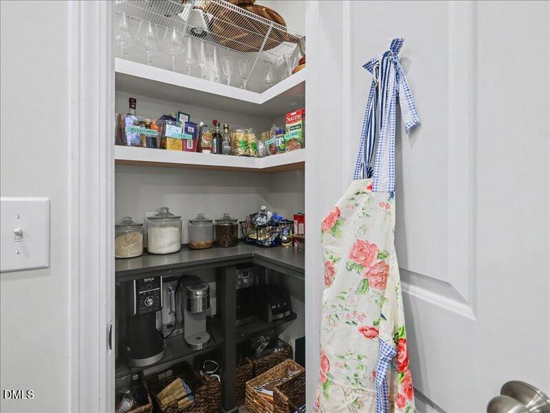 724 Summer Music Lane Raleigh, NC 27603 - Photo 16 of 70 a view of walk in closet with clothes and shoes