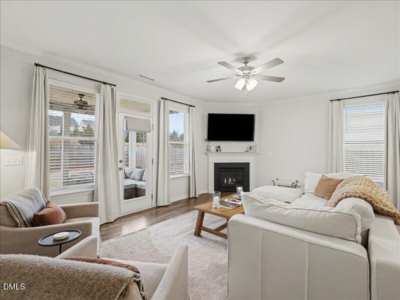 724 Summer Music Lane Raleigh, NC 27603 - Photo 19 of 70 a living room with furniture and a fireplace