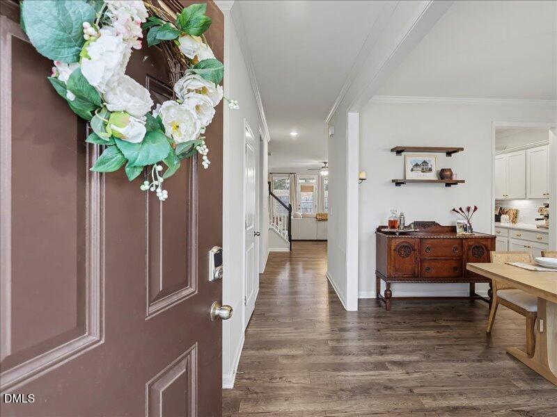 724 Summer Music Lane Raleigh, NC 27603 - Photo 2 of 70 a living room with furniture and a potted plant