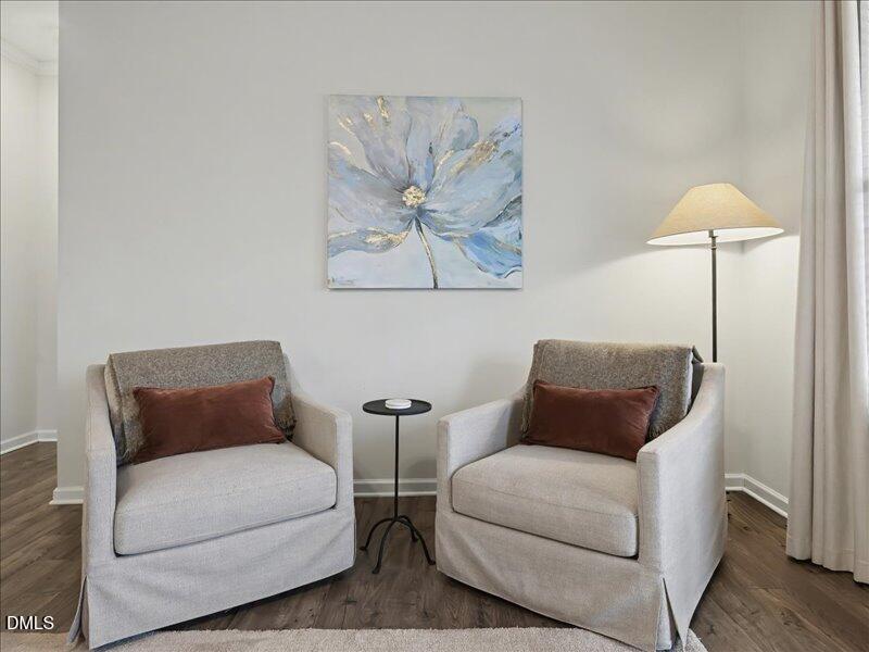 724 Summer Music Lane Raleigh, NC 27603 - Photo 23 of 70 a bedroom with furniture and a lamp