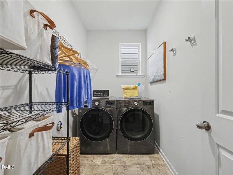 724 Summer Music Lane Raleigh, NC 27603 - Photo 35 of 70 a utility room with dryer and washer