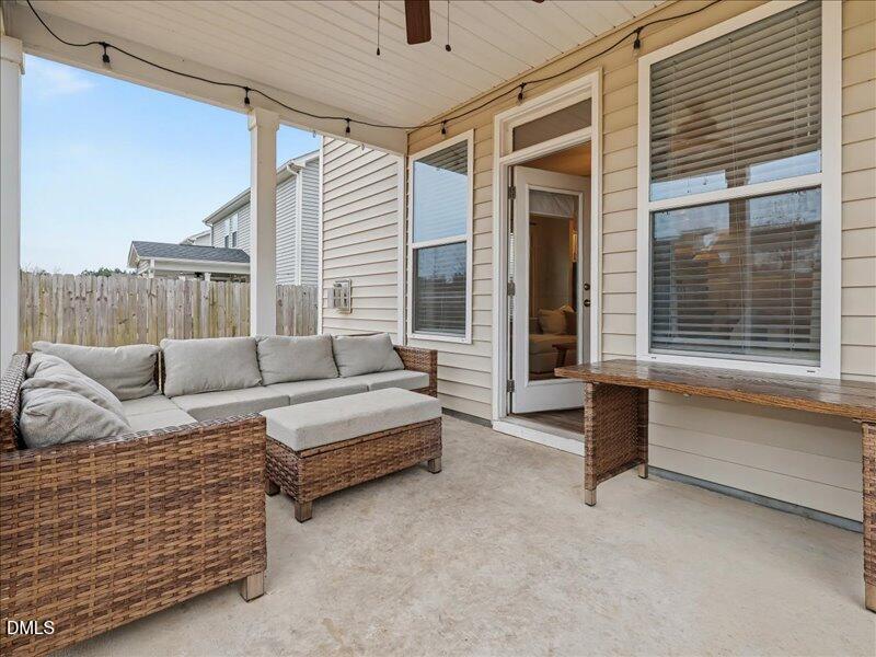 724 Summer Music Lane Raleigh, NC 27603 - Photo 38 of 70 a living room with furniture and a large window