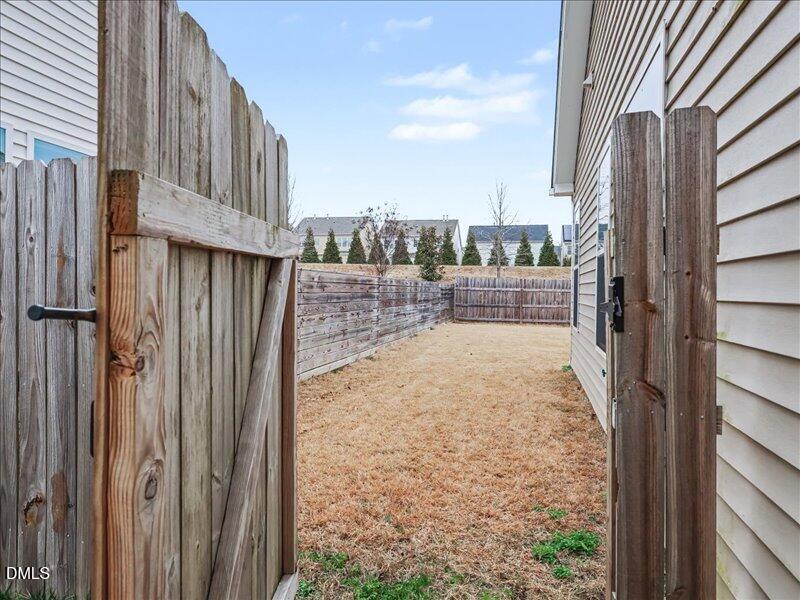 724 Summer Music Lane Raleigh, NC 27603 - Photo 52 of 70 a view of a back yard from a balcony