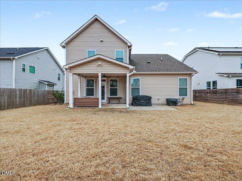 724 Summer Music Lane Raleigh, NC 27603 - Photo 54 of 70 a front view of a house with a yard