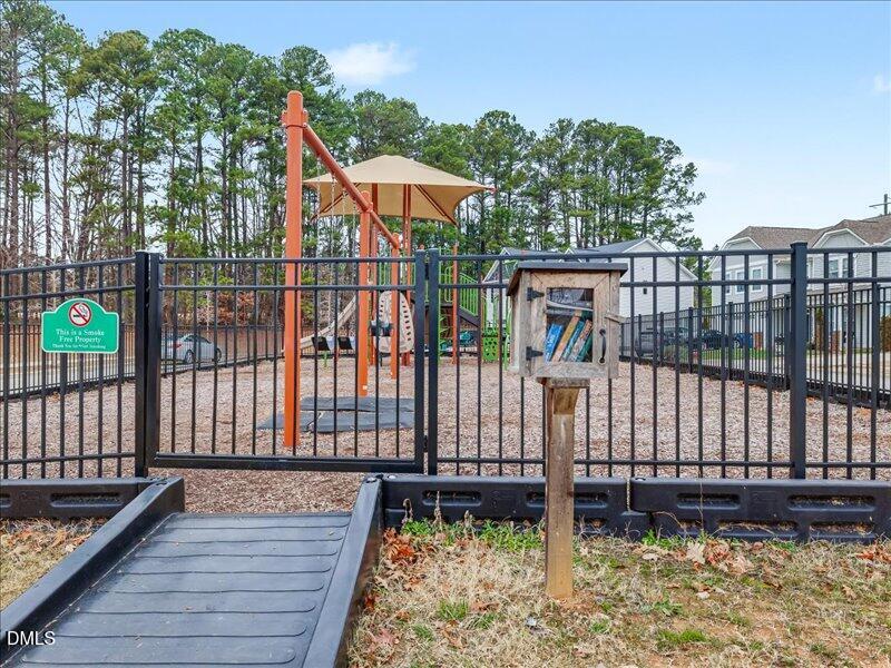 724 Summer Music Lane Raleigh, NC 27603 - Photo 55 of 70 a view of a balcony with wooden floor