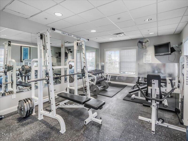 724 Summer Music Lane Raleigh, NC 27603 - Photo 65 of 70 a view of a room with gym equipment