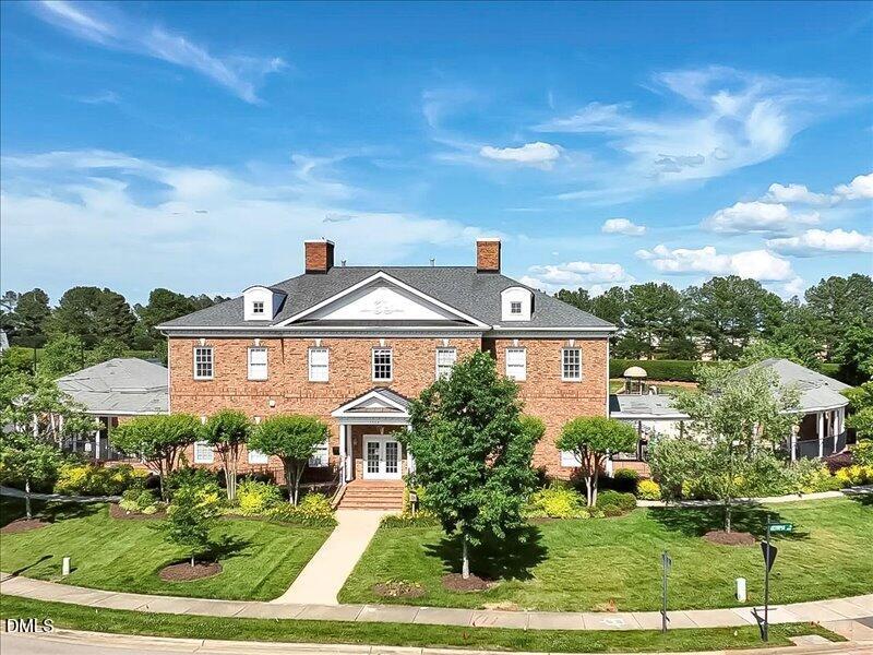 724 Summer Music Lane Raleigh, NC 27603 - Photo 69 of 70 a front view of a house with a yard