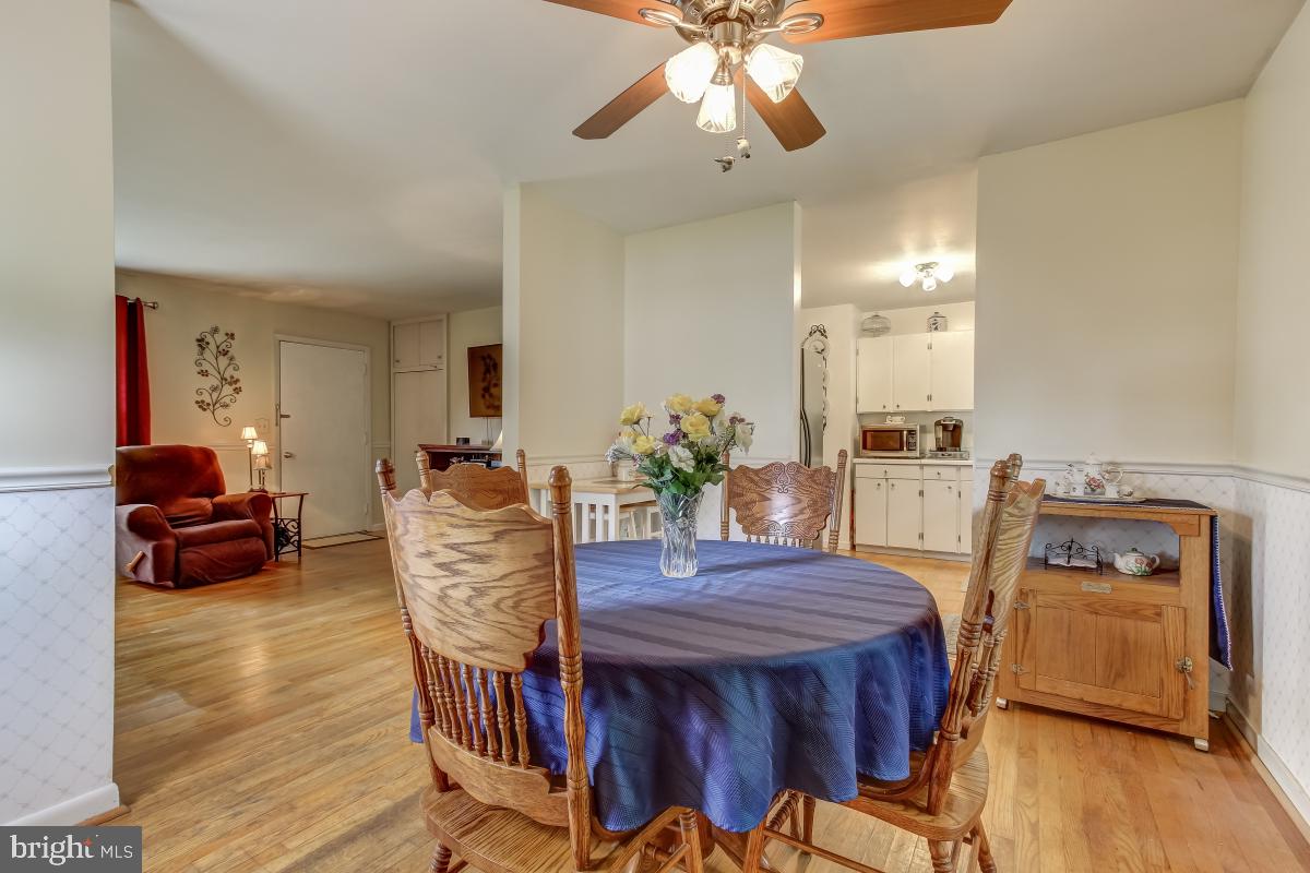 7924 Frye Road Alexandria, VA 22309 - Photo 8 of 29 Dining room w/hardwoods, sun filled