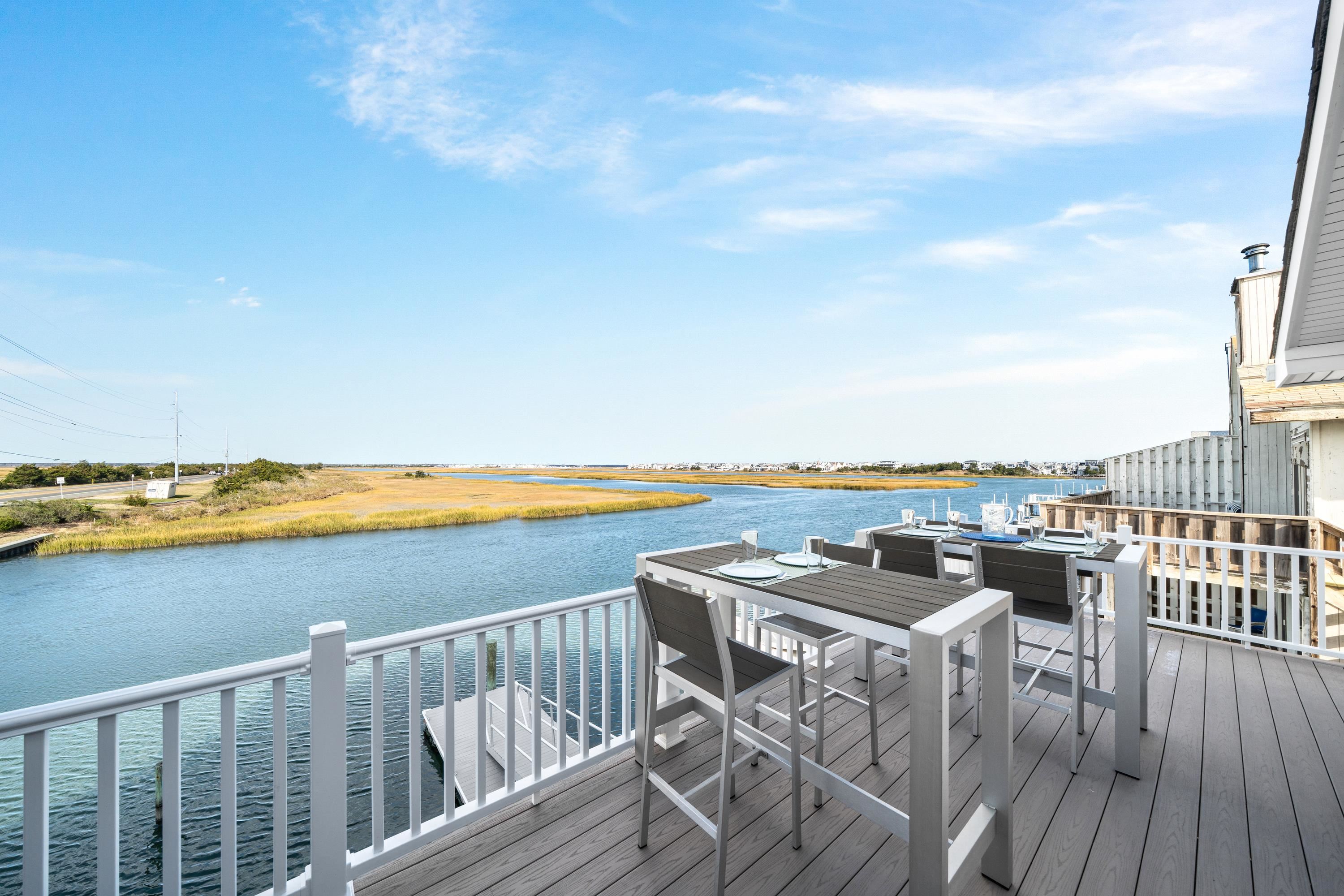 2934 Ocean Drive, Unit NORTH Avalon, NJ 08202 - Photo 31 of 33 a view of a balcony with furniture and wooden floor