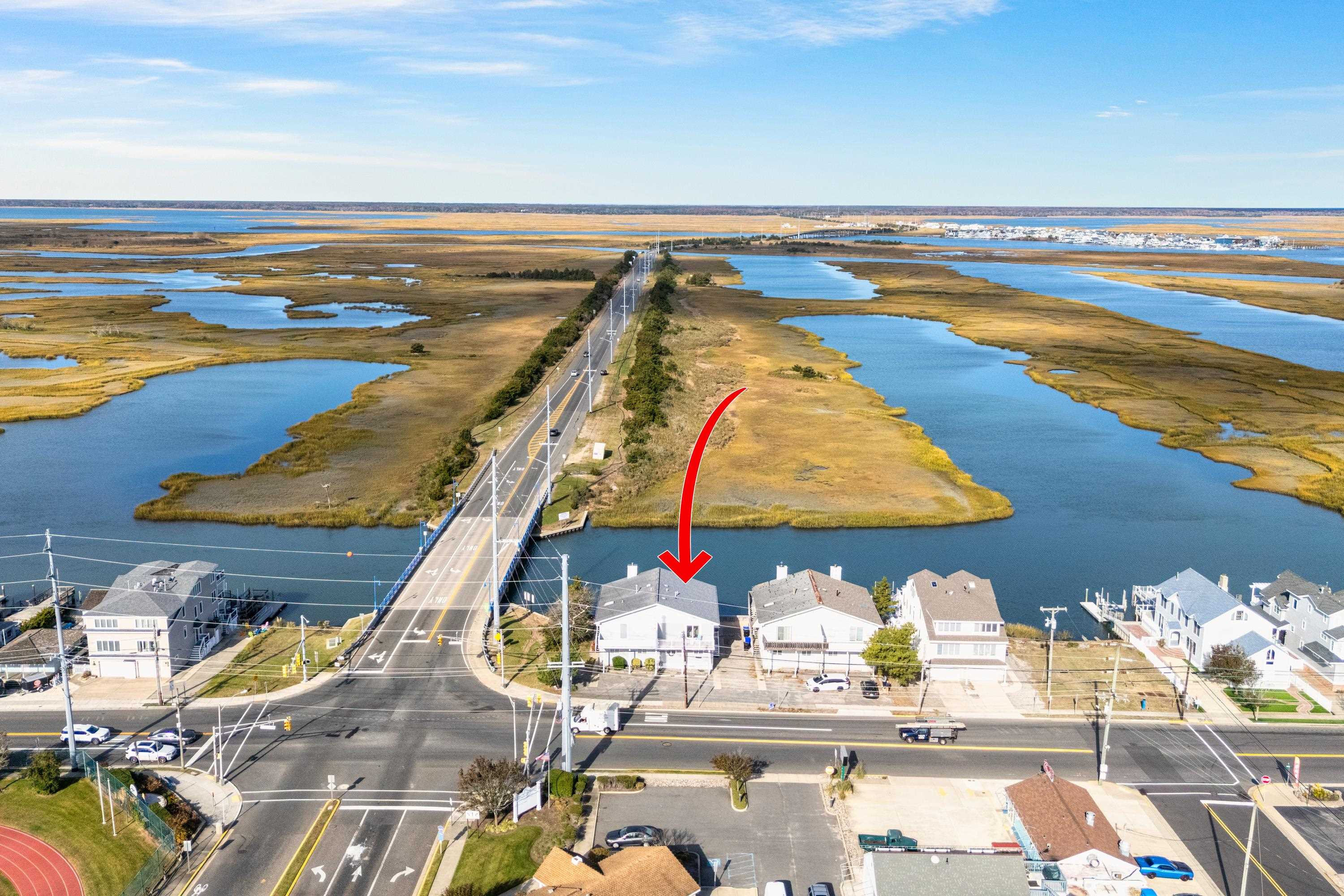 2934 Ocean Drive, Unit NORTH Avalon, NJ 08202 - Photo 32 of 33 a view of swimming pool with outdoor seating and wooden floor