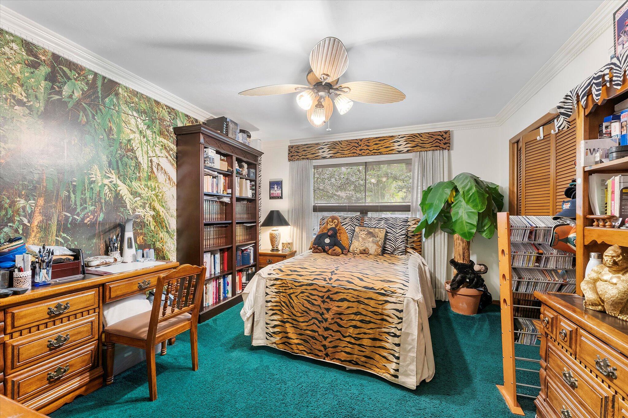 3333 Southwest 59th Street Fort Lauderdale, FL 33312 - Photo 31 of 56 a bedroom with furniture and a chandelier