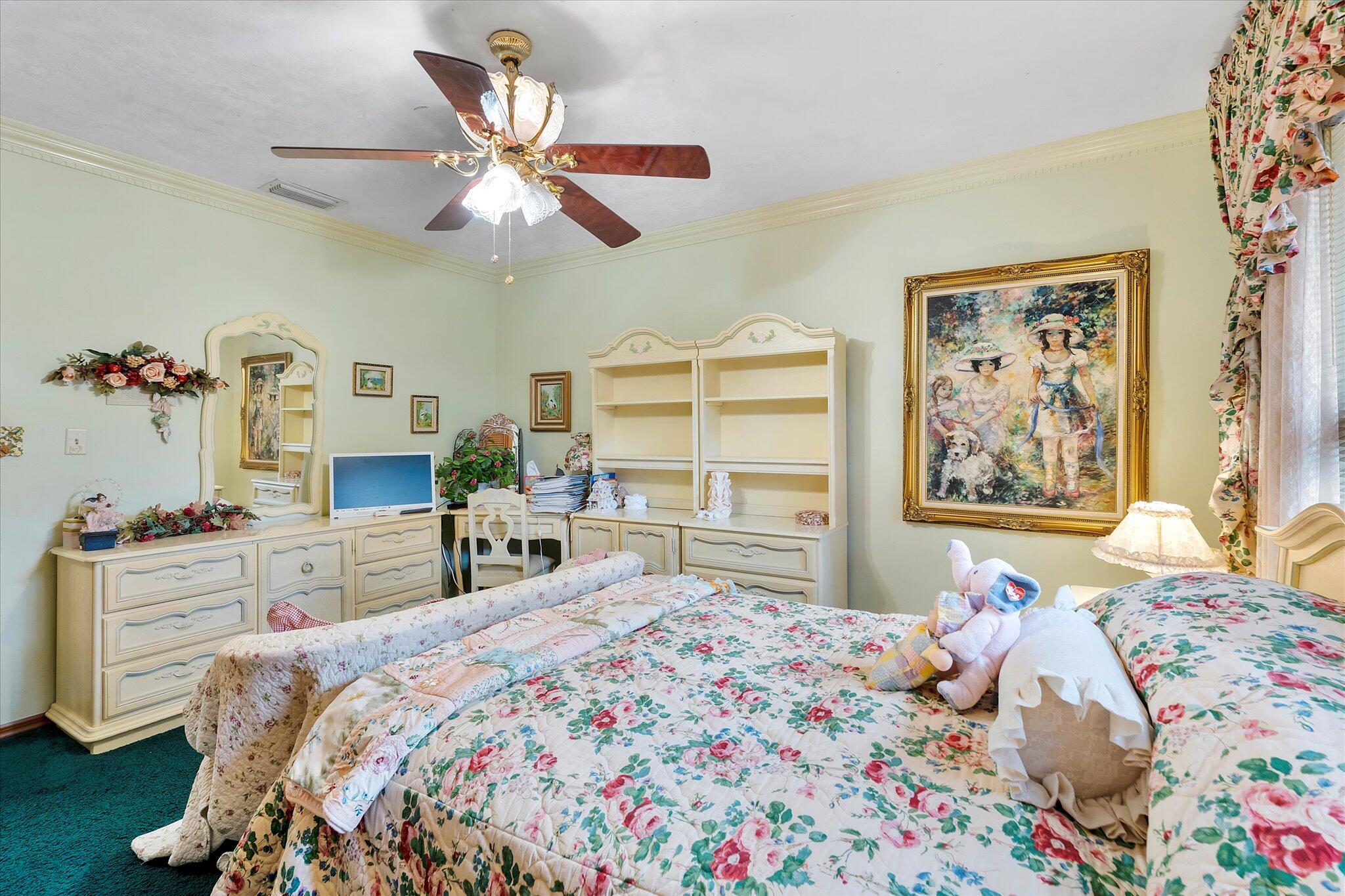 3333 Southwest 59th Street Fort Lauderdale, FL 33312 - Photo 34 of 56 a bedroom with a bed and a dresser