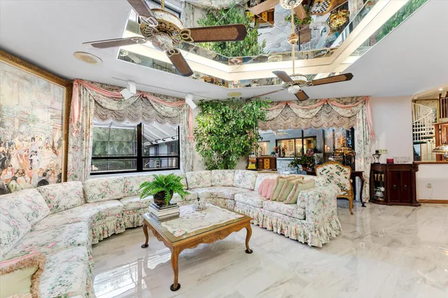 a view of a chairs and tables in the patio