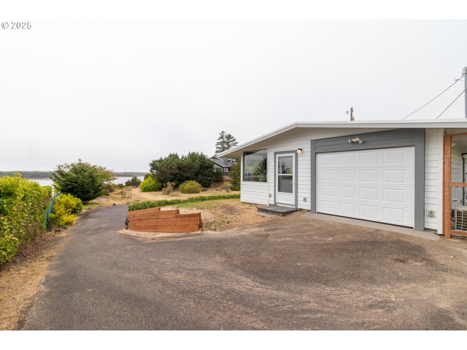 2 Eden Lane Florence, OR 97439 - Photo 14 of 48 a view of a house with a outdoor space