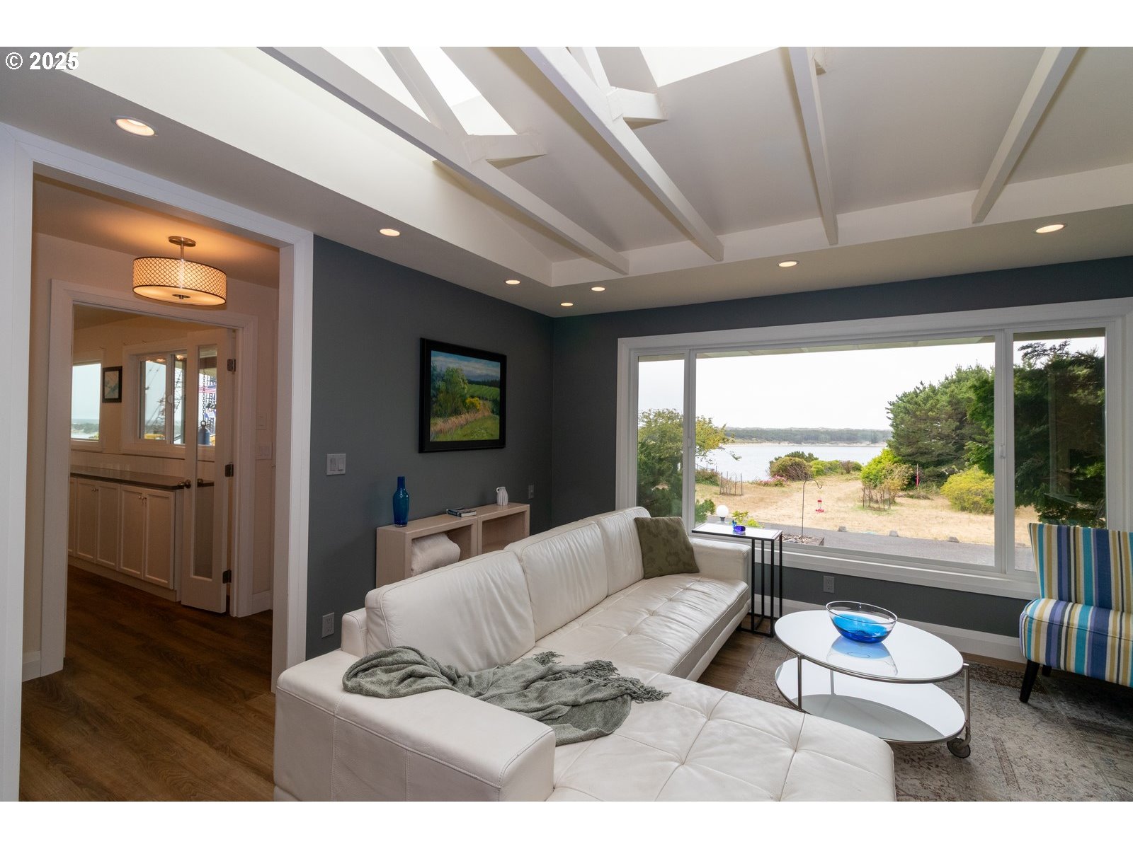 2 Eden Lane Florence, OR 97439 - Photo 16 of 48 a living room with furniture and a large window