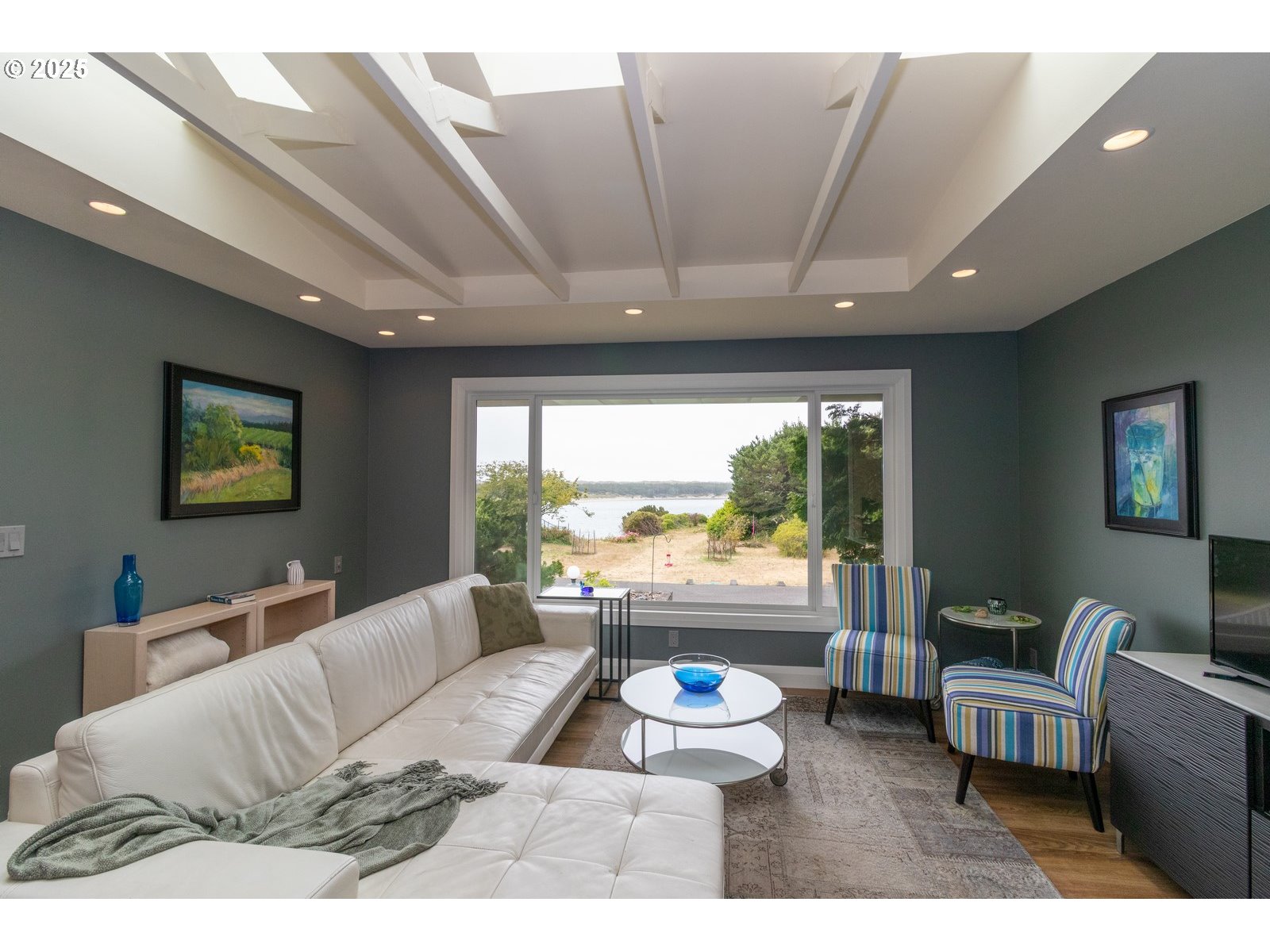 2 Eden Lane Florence, OR 97439 - Photo 17 of 48 a living room with furniture and a large window