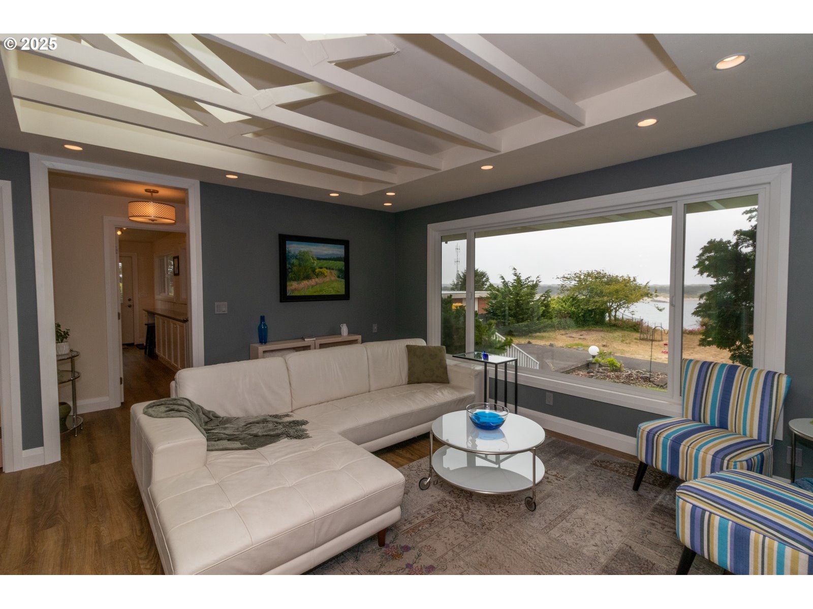 2 Eden Lane Florence, OR 97439 - Photo 23 of 48 a living room with furniture and a large window