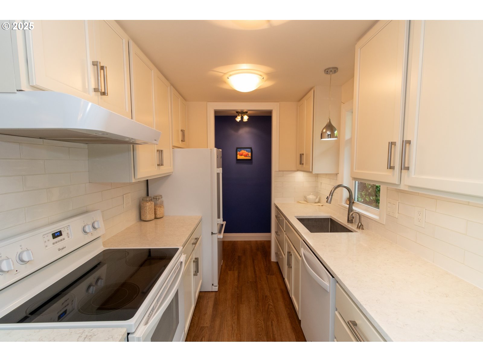 2 Eden Lane Florence, OR 97439 - Photo 27 of 48 a kitchen with a sink stove and cabinets