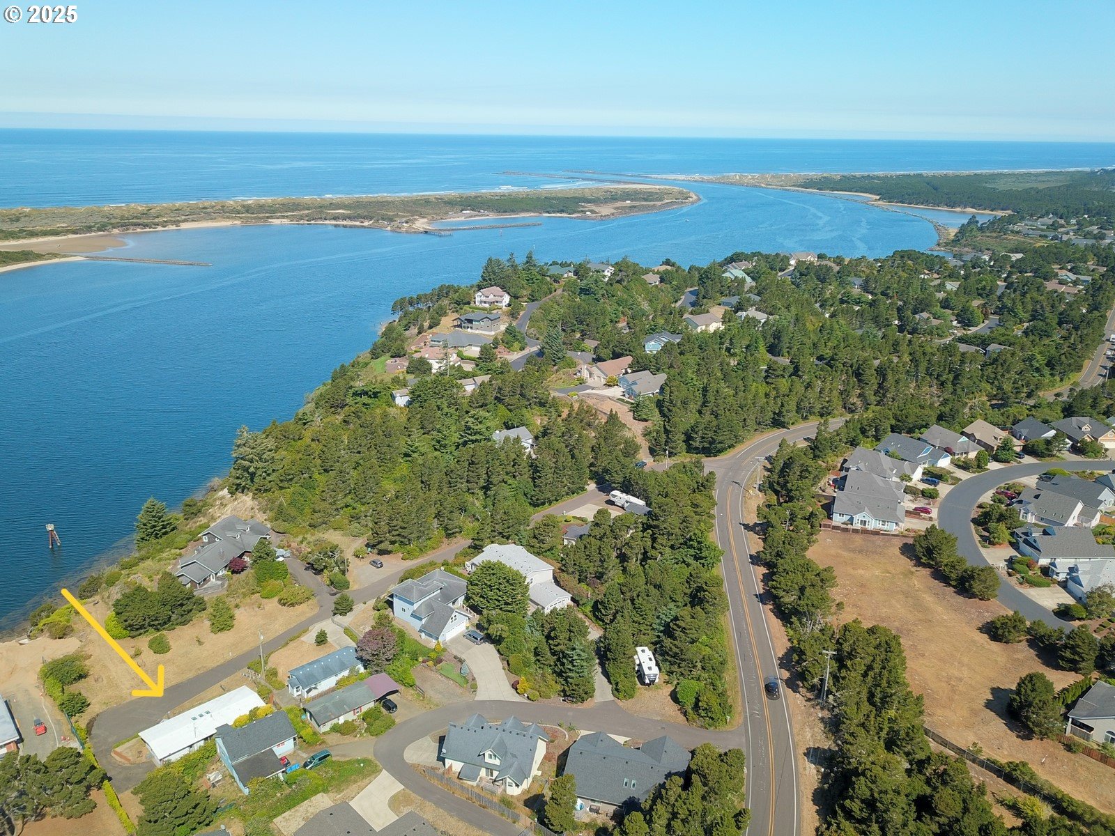 2 Eden Lane Florence, OR 97439 - Photo 3 of 48 a view of an ocean and beach