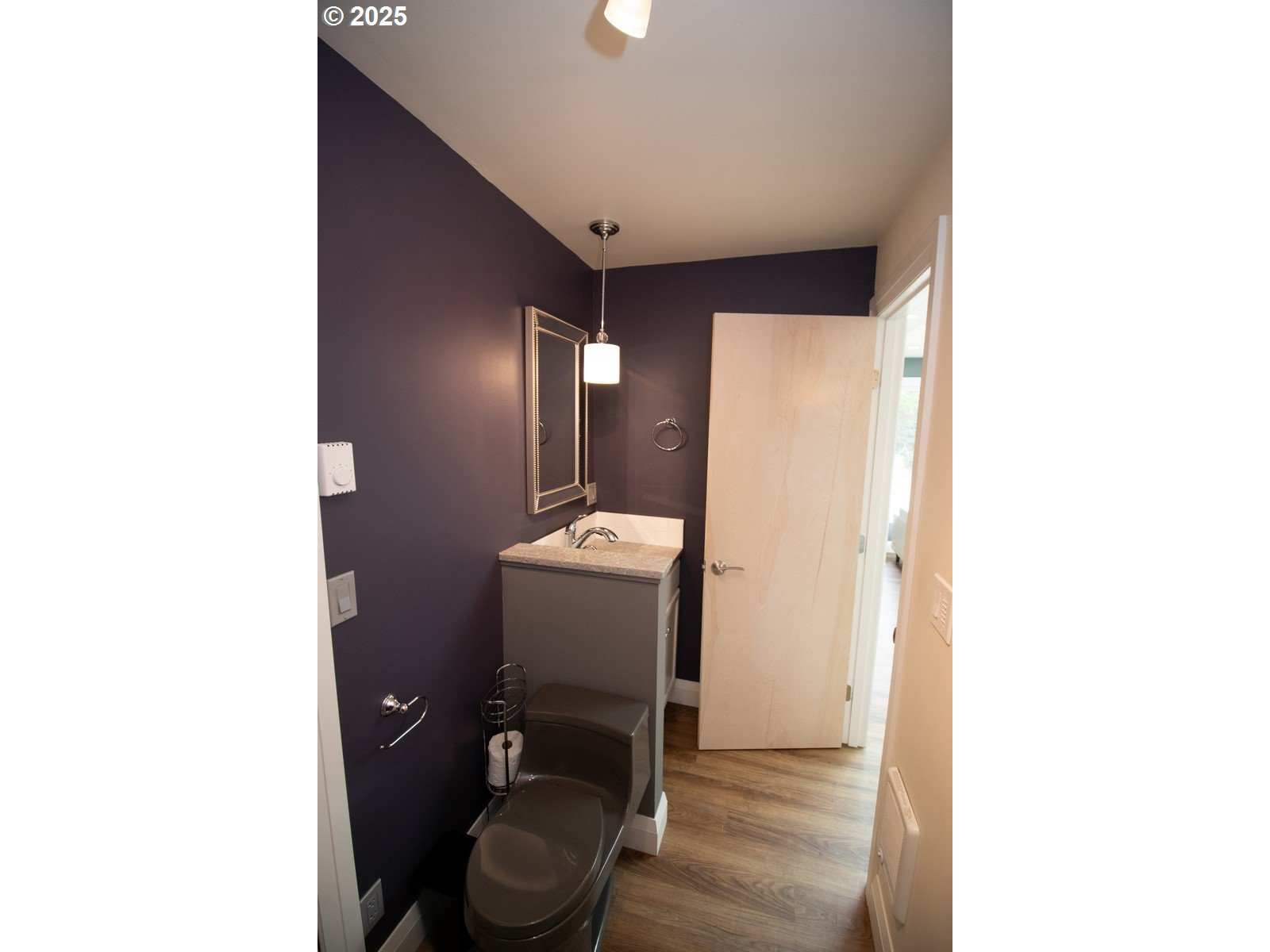 2 Eden Lane Florence, OR 97439 - Photo 31 of 48 a bathroom with a toilet and a mirror