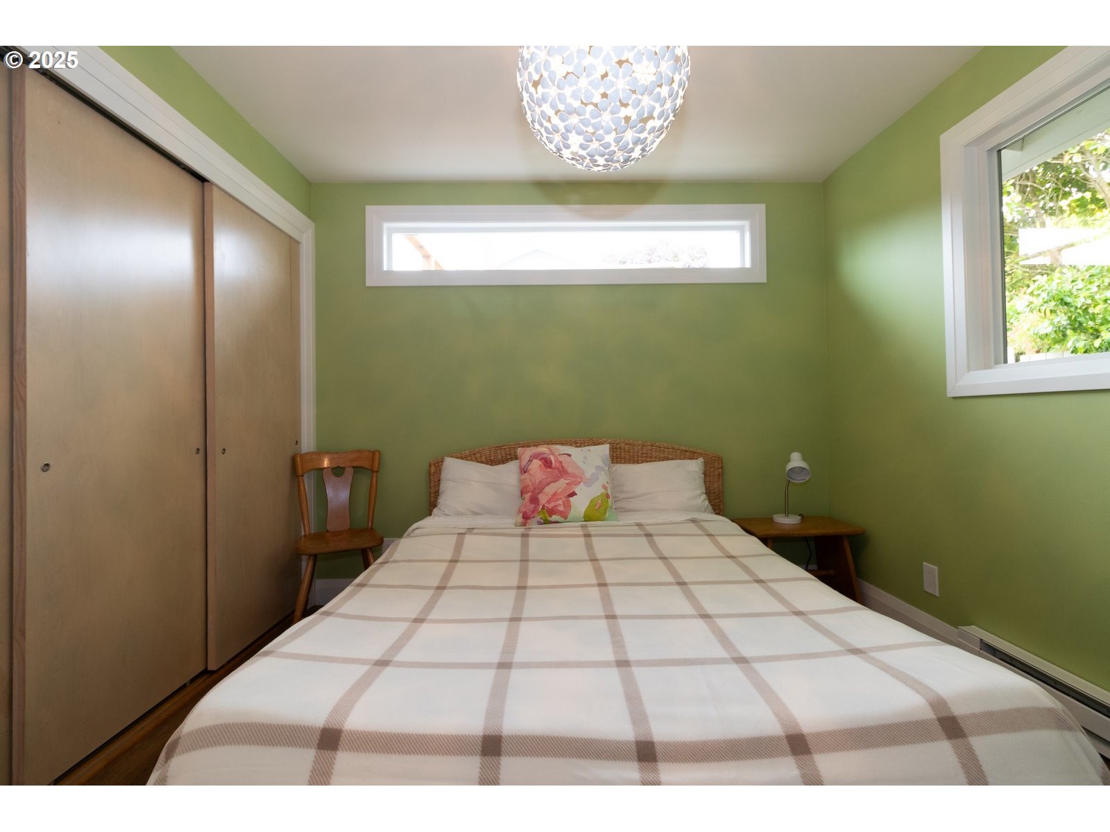 2 Eden Lane Florence, OR 97439 - Photo 32 of 48 a bedroom with a bed and a night stand