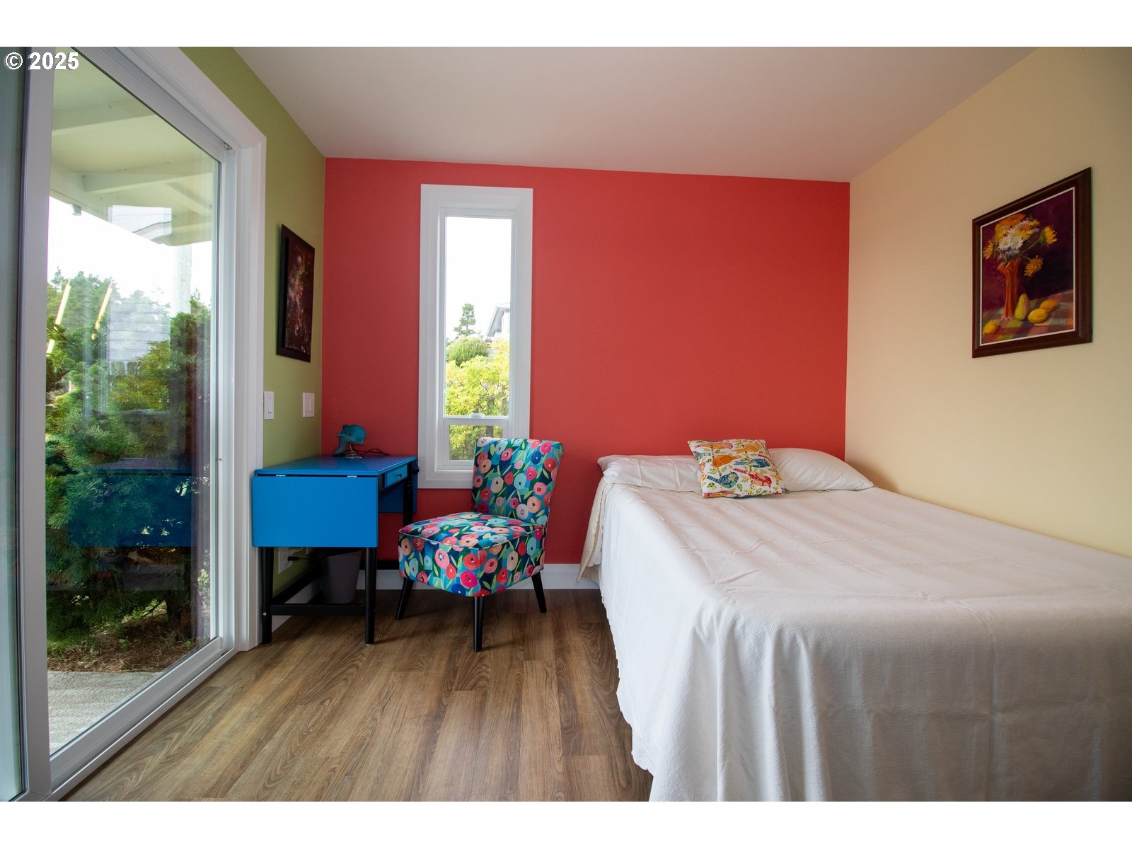 2 Eden Lane Florence, OR 97439 - Photo 39 of 48 a bedroom with a bed table chair and a window