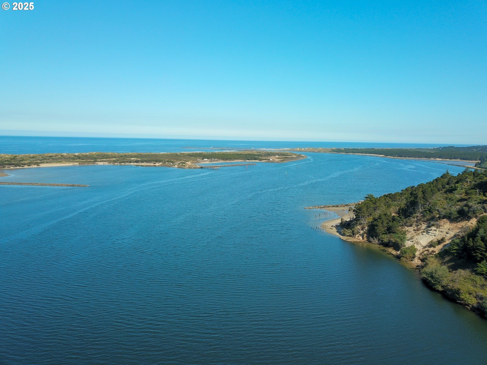 2 Eden Lane Florence, OR 97439 - Photo 47 of 48 a view of an ocean and beach