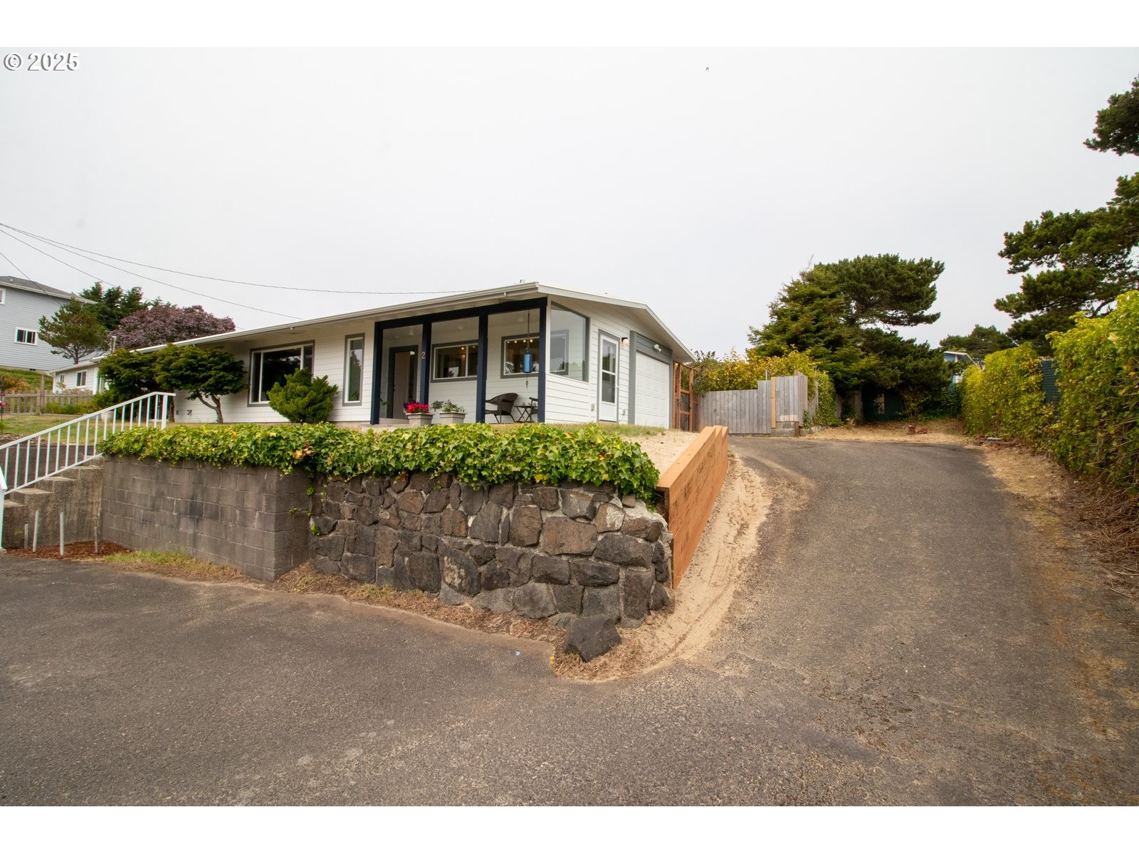 2 Eden Lane Florence, OR 97439 - Photo 7 of 48 a house view with a lake view