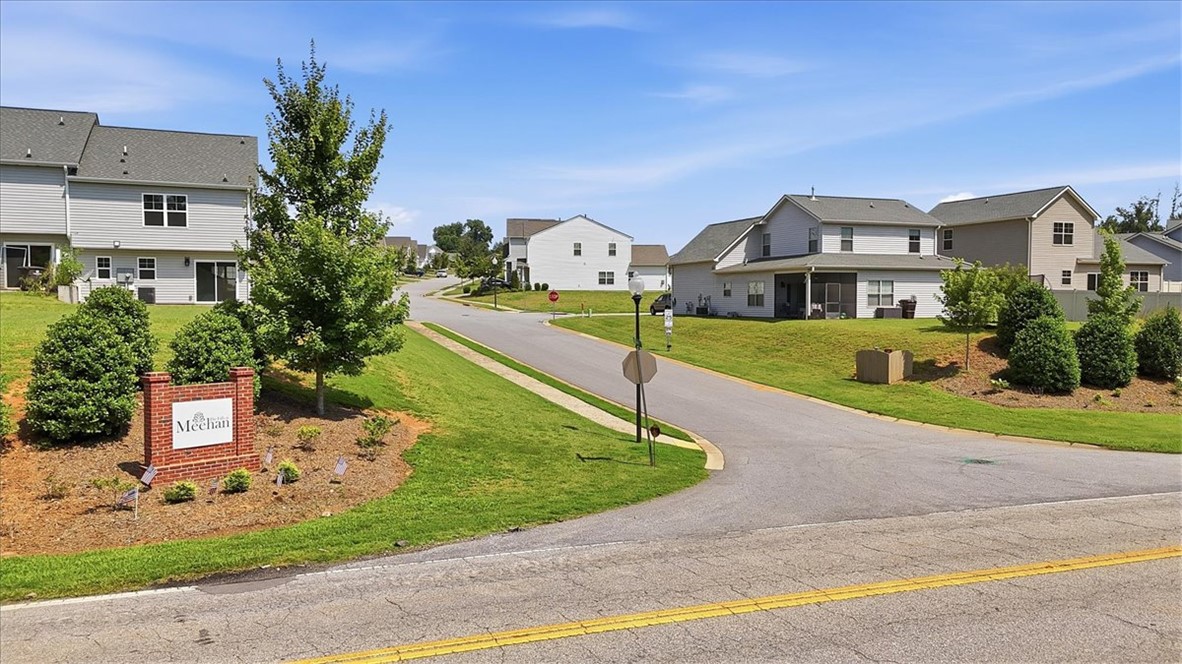 208 Grassy Creek Way Pendleton, SC 29670 - Photo 41 of 43 Welcome to a residential neighborhood, offering a serene community ambiance with well-maintained grounds.