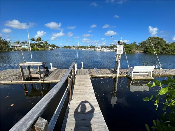 a view of a balcony with seating area