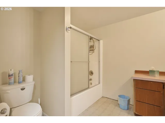a bathroom with a toilet and a sink